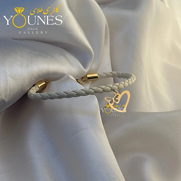 دستبند چرم طوسی شاپرک قلبی طلا